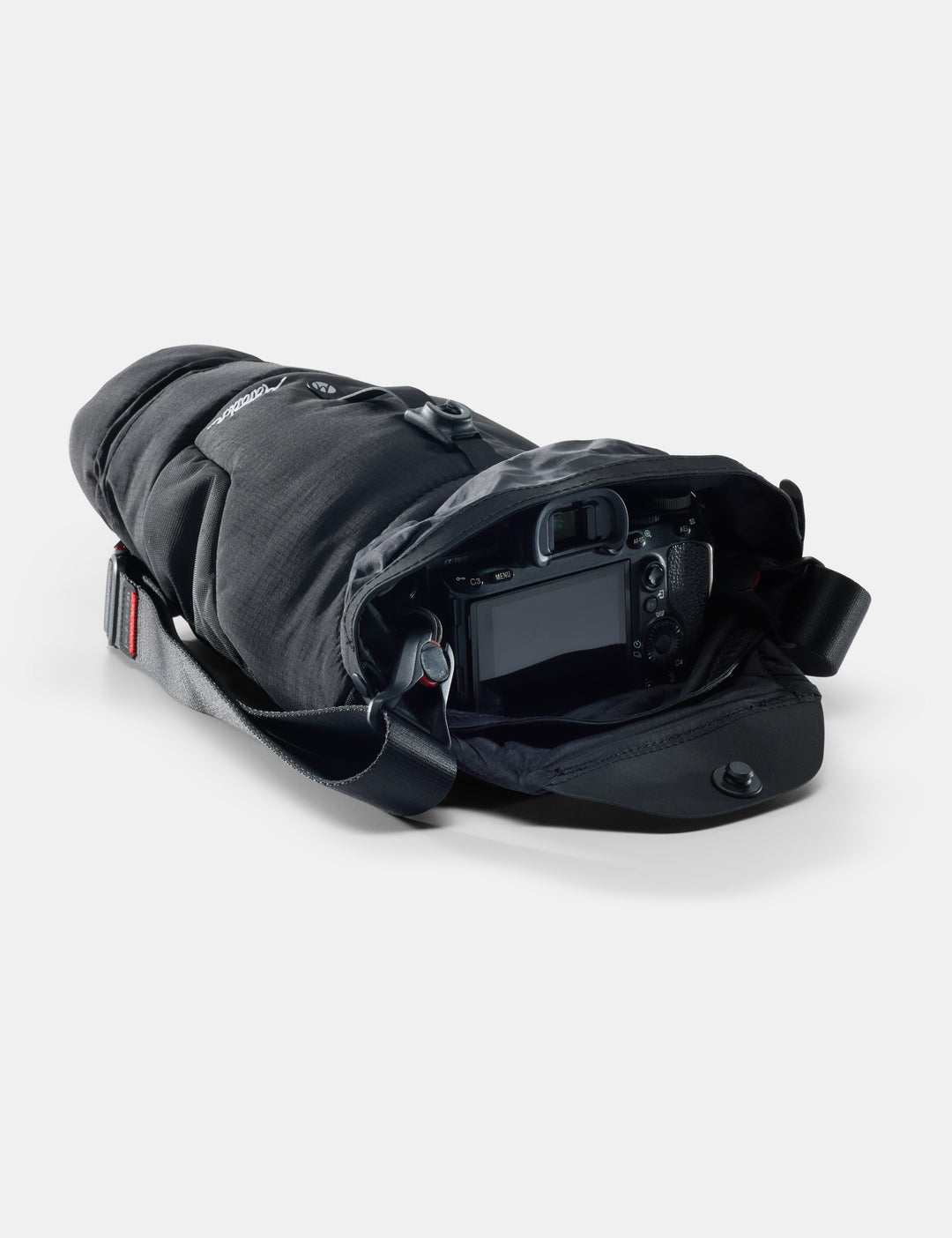 Matador Camera Base Layer 2.0 - black protective gear with a camera inside on a white background