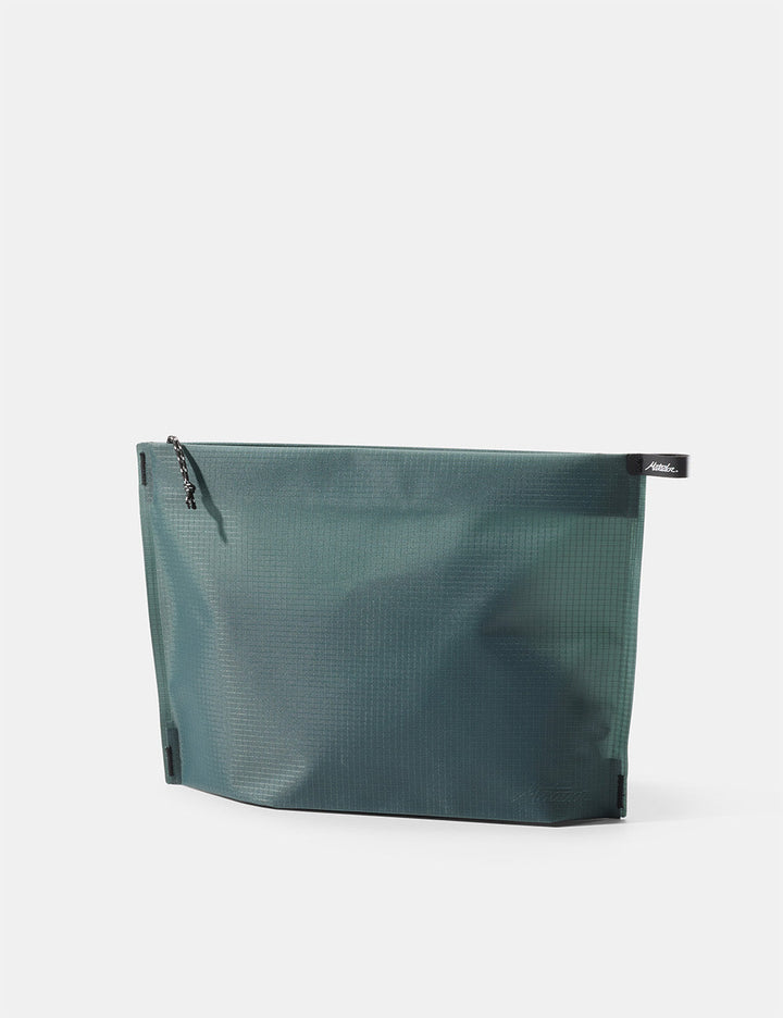 Matador FlatPak Zipper Toiletry Case (V2) in Juniper - blue-green zipper toiletry case on a white background