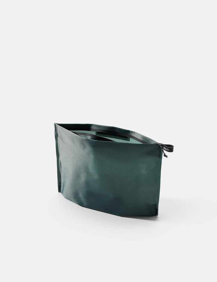 Matador FlatPak Zipper Toiletry Case (V2) in Juniper - open Blue-green zipper toiletry case on a white background