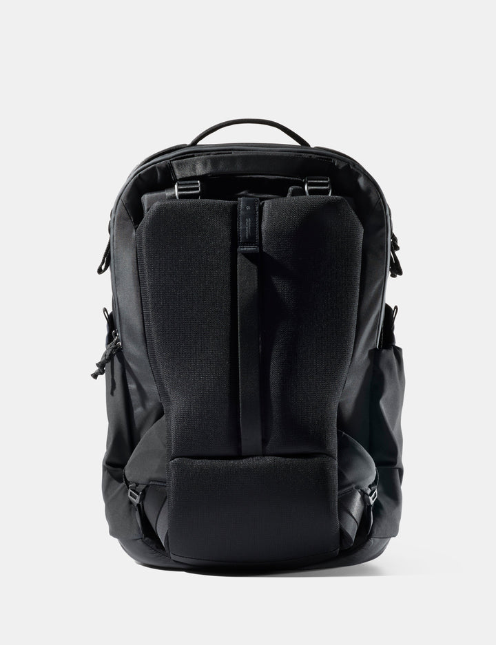 Matador 35L Global Travel Pack in Black - black backpack on a light gray background