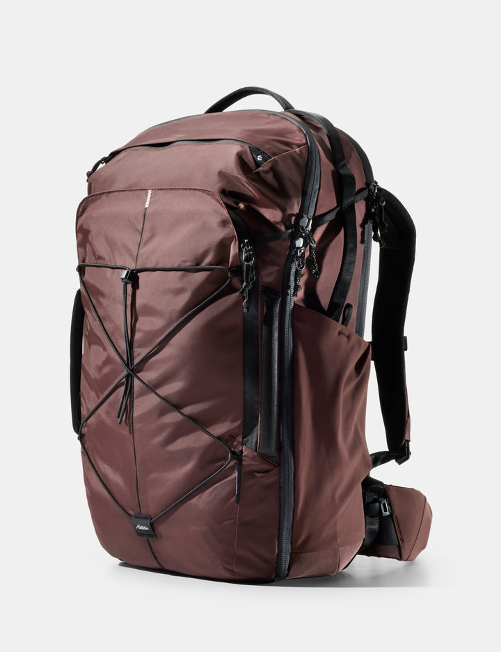 Matador 45L Global Travel Pack in Garnet - garnet backpack with black straps on a white background