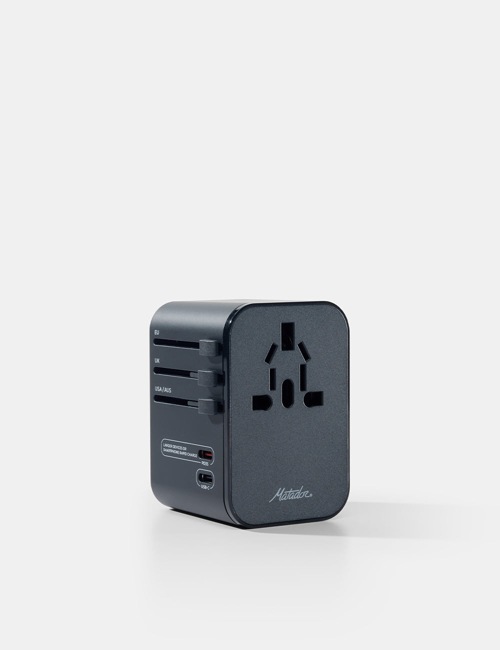 Matador Global Travel Adapter in Black - black travel adapter on a white background