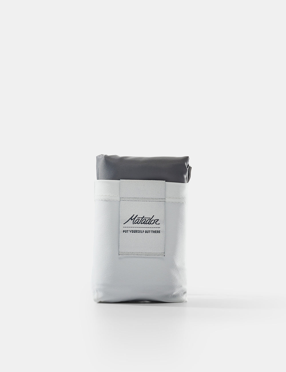 Matador Pocket Blanket™ 4.0 - 160 x 110cm in Ghost Grey - gray and white pouch with a brand label on a white background