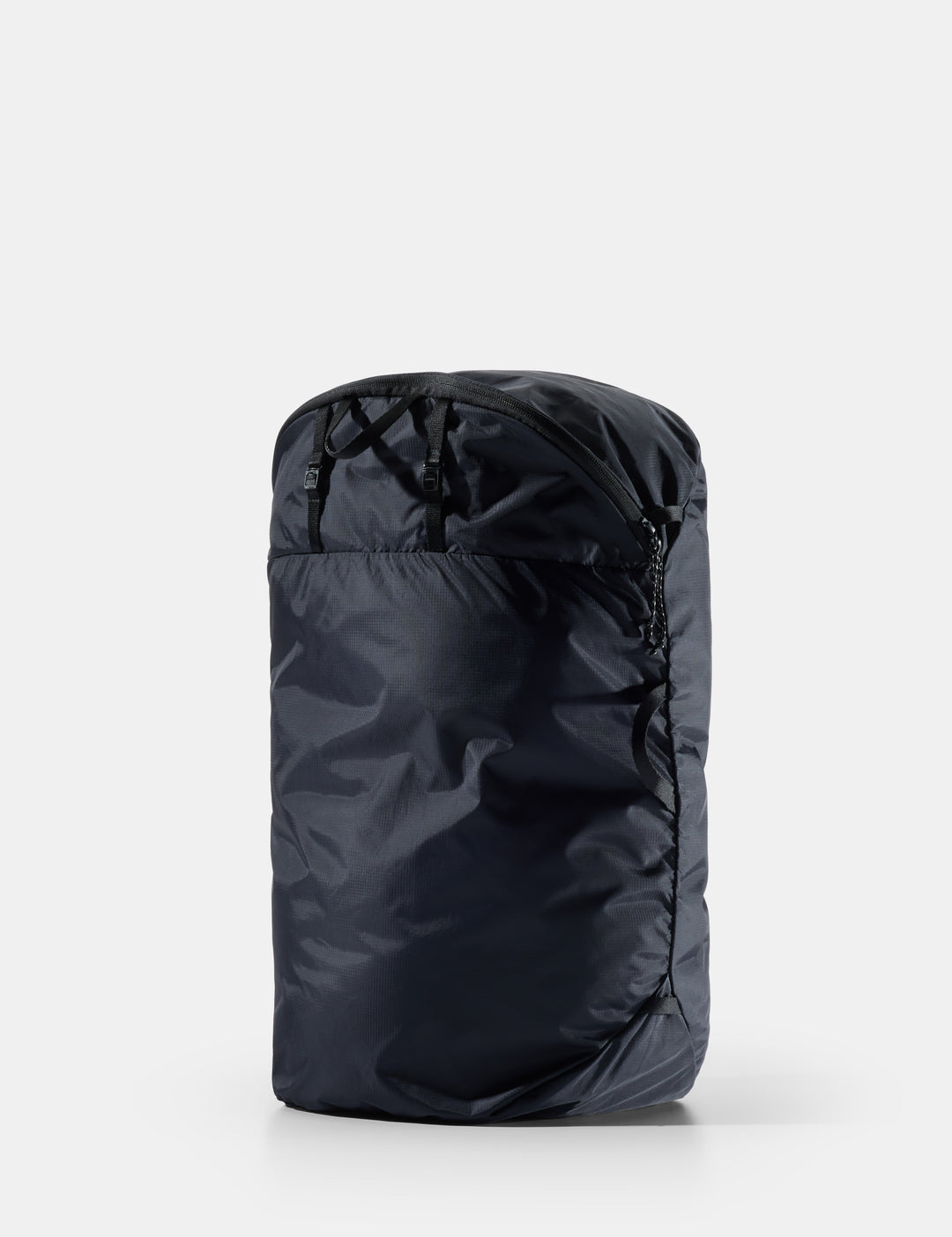Matador Packable Laundry Bag - black compression sack on a white background