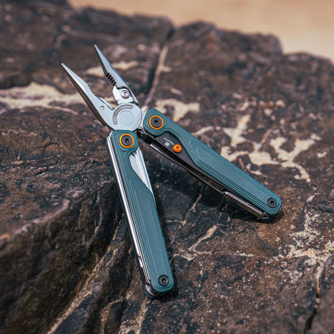 Leatherman Wave Alpha - Cascadia with pliers open on a rock - Nitecore Singapore