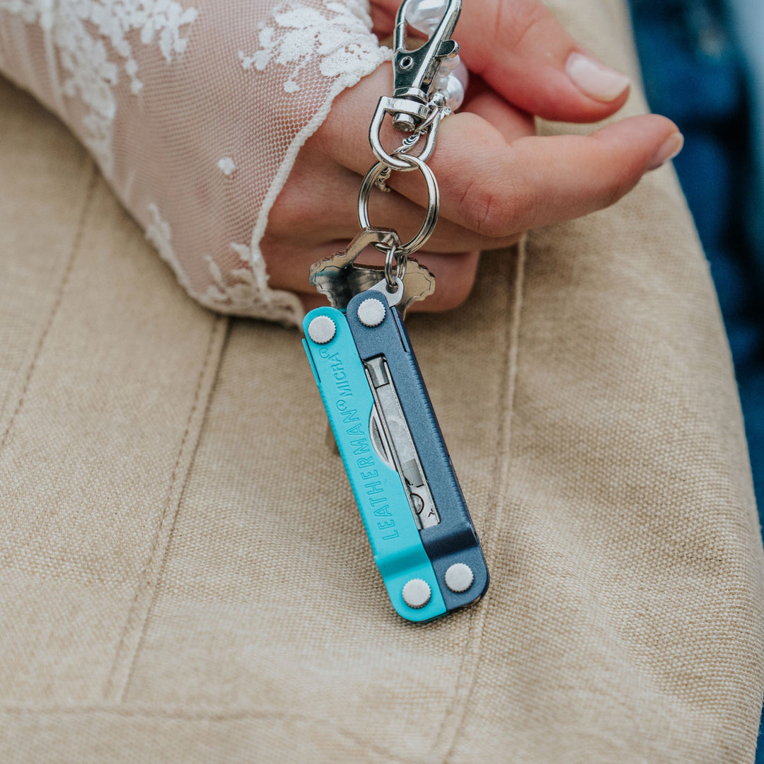 Leatherman Micra - Lavender Mist on a key ring in hand - Nitecore Singapore