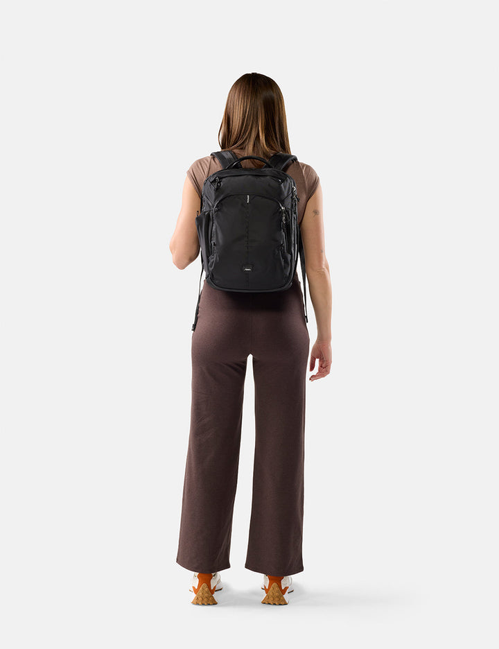 Matador 18L Personal Item Travel Pack in Black - on-model video